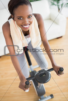 High view of a black woman on an exercise bike