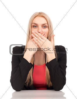 Business woman covering her mouth