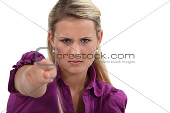 Angry woman pointing her finger