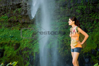 Young woman hiking in summer