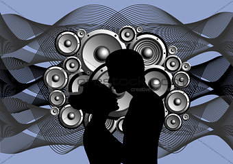 Silhouette of boy and girl on abstract music background
