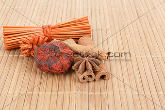 Star Anise and cinnamon on wooden background 