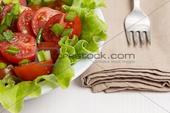 fresh light salad with cherry tomatoes and chives