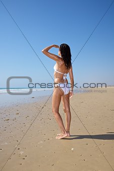 white bikini woman watching far