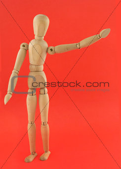 wooden figure in a welcoming pose