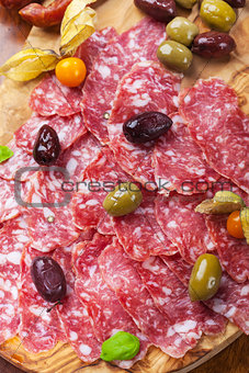 Traditional Italian salami with olives