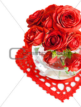 red roses with green leaf in a vase