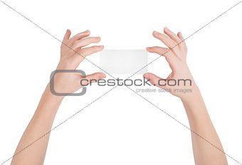 Hands with card