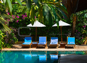 Swimming pool in tropical resort 