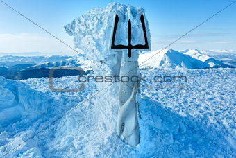 Winter Goverla Mount top and  monument to Ukrainian Tryzub.