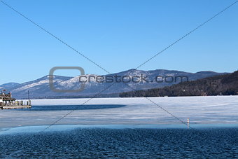 Scene of icy water and mountain range
