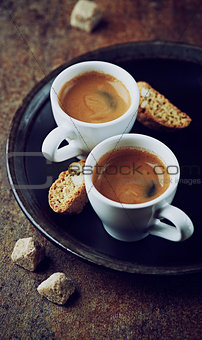 Two cups of espresso with cantuccini