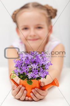 Happy child with spring flowers