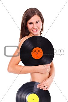 Sexy nude girl holding vinyl discs