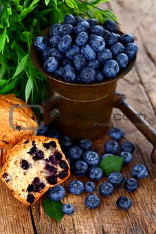 Blueberries in antique mortar