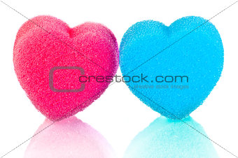 Two hearts of blue and pink lips on a white background