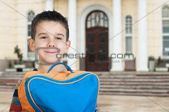 Boy with schoolbag