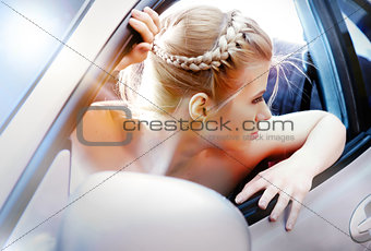  Young woman in the car.