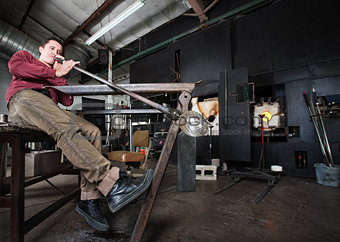 Worker Blowing Glass