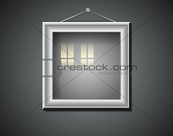 Blank picture frame with window reflection