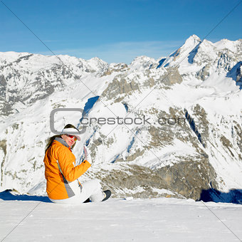 woman in winter mountains, Alps Mountains, Savoie, France
