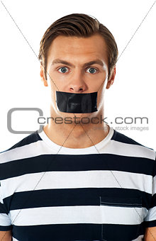 Man with duct tape over his mouth