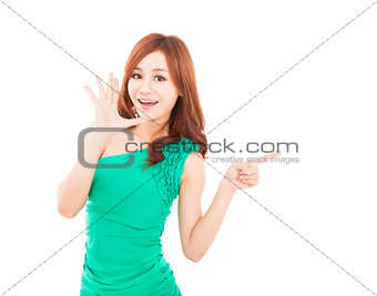 happy young woman shouting and pointing at something