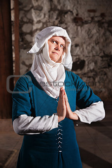 Sinister Nun in Prayer