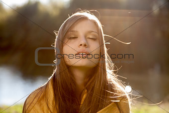young beautiful woman with closed eyes