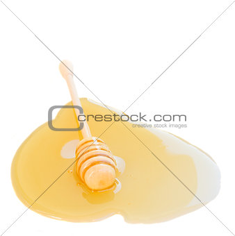 honey stick in puddle