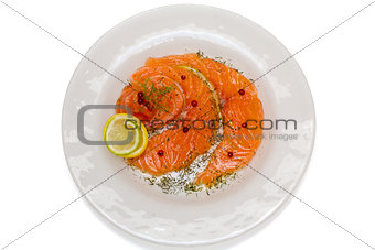 Salmon carpaccio with pink pepper