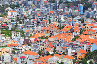 Little houses crammed in a big city in Asia