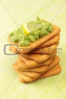 crackers with avocado cream