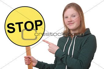 Teen holds sign