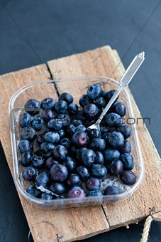 Fresh blueberries and fork