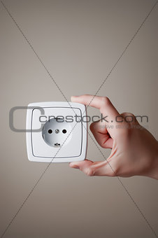 Hand with electric outlet