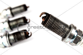 Four worn out spark plugs