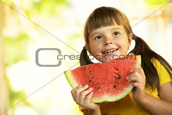 girl with a piece of watermelon