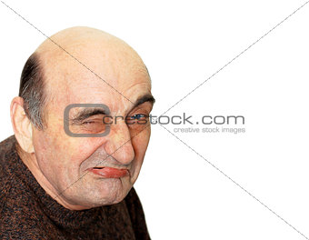 old man with a grimace on his face
