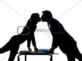 business woman man couple  lovers kissing silhouette