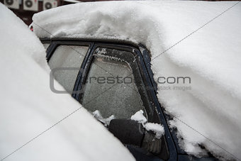 car under the icy crust