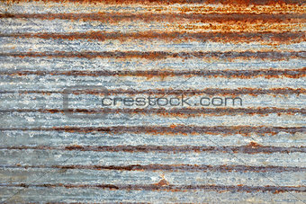 Ribbed metal plate with shelled paint