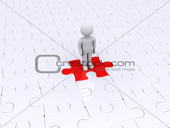 Person standing on different puzzle piece