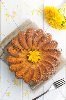 Cake with dandelion's flowers