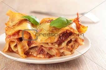 lasagne on wooden table