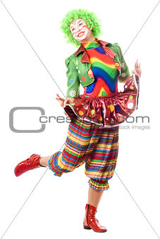 Happy posing female clown