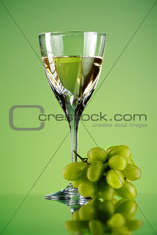 glass of wine and grape bunch