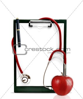 Stethoscope with a clipboard and a red apple