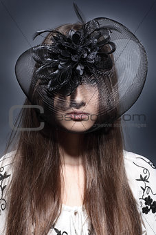 girl in a beautiful hat