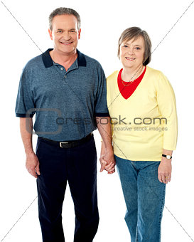 Happy matured couple posing